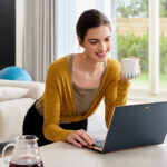 swift-5-lady-elegantly-using-laptop-at-home-l